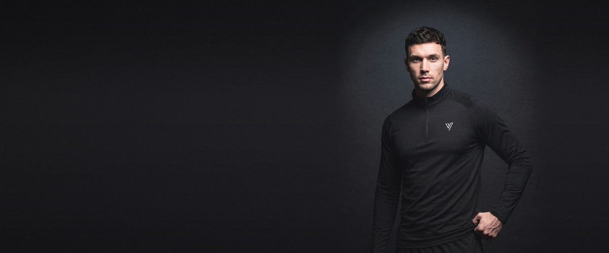 VCTRS Black Tiro Training Top, worn by a model